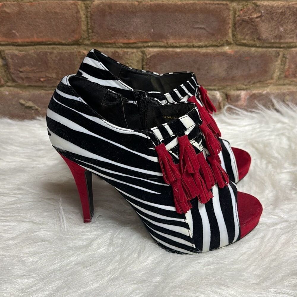 Elegant Striped Heels with Red Tassels